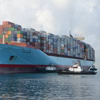 The containership Sofie Maersk is escorted by tugs into Honolulu Harbor. (U.S. Coast Guard photo by Amanda Levasseur)