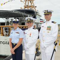 The cutter’s command group, (left to right) Petty Officer 1st Class Nicole Thomas, first officer of the deck, Lt. j.g. Graham Sherman, executive officer, and Lt. Kevin Connell, commanding officer, were on hand to bring the ship to life. (U.S. Coast Guard photo by Sabrina Laberdesque)