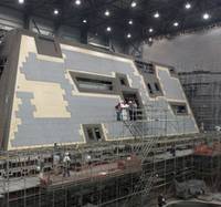 The deckhouse for DDG 1000, the first Zumwalt-class destroyer, is currently under construction at Ingalls Shipbuilding's Composite Center of Excellence in Gulfport, Miss. (Photo: HII)