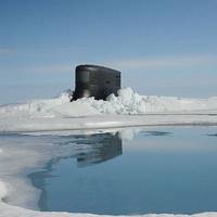 The fast attack submarine USS Seawolf surfaces through Arctic ice at the North Pole. (U.S. Navy photo)