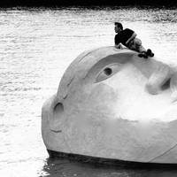 The Floating Head, a sculpture created by artist Richard Groom, as the centrepiece for Glasgow’s 1988 Garden Festival, has been lovingly restored over the past six months, and is now on public display at Canting Basin at Govan Docks, adjacent to Glasgow Science Centre, for the next four weeks. Pictured is Richard Groom on Floating Head on the Clyde. Photo courtesy AMS