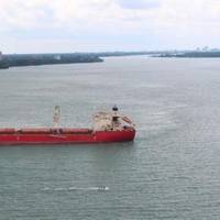 The Hong Kong-flagged freighter vessel Federal Rideau sits hard aground in the downbound shipping channel of Lake St. Clair near the Detroit River, July 28, 2014. The vessel is carrying approximately 22,672 tons of wheat and was headed to Montreal. (U.S. Coast Guard photo courtesy of Coast Guard Air Station Detroit)