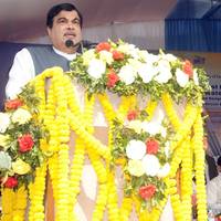 The Indian Shipping Minister Nitin Gadkari addressing the gathering at the dedication of the New Brahmaputra Bridge to the Nation and the foundation stone laying of Development of River Barak as National Waterways No.16 Shipping and Navigation, at Guwahati on January 29, 2017. The Chief Minister of Assam, Shri Sarbananda Sonowal and the Minister of State for Railways, Shri Rajen Gohain are also seen. Photo: PIB