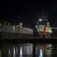 The National Security Cutter Munro (WMSL 755) sits in the floating dry dock at Ingalls Shipbuilding prior to its launch on Saturday. (Photo by Lance Davis/HII)