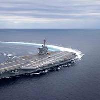The Nimitz-class aircraft carrier USS Abraham Lincoln (CVN 72) conducts high-speed turn drills in the Atlantic Ocean during sea trials. Photo: United States Navy