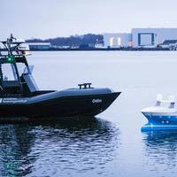 The ODIN USV and a working scale model of the YARA Birkeland all-electric, autonomous container vessel were on the water for yesterday’s opening event (Photo: Kongsberg)