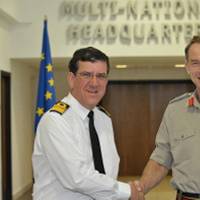The outgoing Operation Commander Rear Admiral Peter Hudson CBE (left) hands over to the new Operation Commander Major General Buster Howes OBE. (Photo courtesy EU NAVFOR)