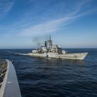 The Peruvian frigate BAP Quiñones (FM 58) is underway alongside the Ticonderoga-class guided-missile cruiser USS Lake Champlain (CG 57) during a leapfrog exercise. Lake Champlain is participating in Silent Forces Exercise 2018 with the Peruvian and Colombian navies. (U.S. Navy photo by Mass Communication Specialist 1st Class Nathan Carpenter/)