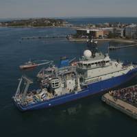The research vessel Neil Armstrong was met by a jubilant crowd at the WHOI dock Wednesday, as it arrived to its homeport for the first time. (Photo by Daniel Cojanu, WHOI)
