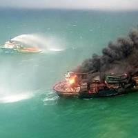 The Singapore-registered MV X-Press Pearl, carrying 1,486 containers, including 25 tonnes of nitric acid along with other chemicals and cosmetics, was anchored off Sri Lanka's west coast when a fire erupted onboard after an explosion on May 20, 2021. (Photo: Sri Lanka Coast Guard)