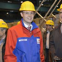 The steel cutting took place at the Meyer Werft shipyard in Papenburg, Germany, where the two ships will be built. Pictured here are (from left to right) Jan Meyer, Managing Partner, Meyer Werft and Harri Kulovaara, EVP, Newbuild and Design, Royal Caribbean International.