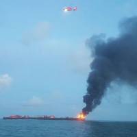 The U.S. Coast Guard responds to barge on fire approximately three miles from Port Aransas, Texas. (U.S. Coast Guard phot)