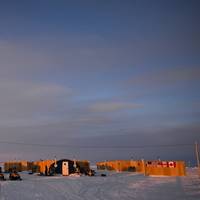 The view at sunset of Ice Camp Nautilus, located on a sheet of ice adrift on the Arctic Ocean, during Ice Exercise (ICEX) 2014. ICEX 2014 is a U.S. Navy exercise highlighting submarine capabilities in an arctic environment. (U.S. Navy photo by Joshua Davies)