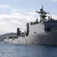 The Whidbey Island-class dock landing ship USS Ashland (LSD 48) arrives at the Marathi NATO Pier Facility for a routine port visit. Ashland is homeported at Navy Amphibious Base Little Creek, Va. and is deployed supporting maritime security operations. U.S. Navy photo by Paul Farley