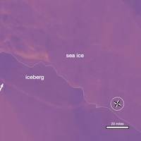 Thermal wavelength image of a large iceberg, which has calved off the Larsen C ice shelf. Darker colors are colder, and brighter colors are warmer, so the rift between the iceberg and the ice shelf appears as a thin line of slightly warmer area. Image from July 12, 2017, from the MODIS instrument on NASA's Aqua satellite. (Image: NASA Worldview)