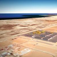 This artist rendition and those at the top of the page show what the facility — which will span 500,000 square meters — will look like. Image: Saudi Aramco