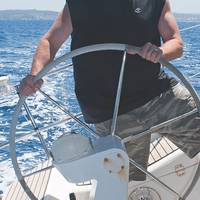 “Throwback Thursday” from the Maritime Reporter archives: Greg at the wheel on a sailing excursion off the coasts of Italy and France in August 2011
