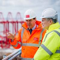 Transport Minister Andrew Jones (right) with Warren Marshall, Group Planning Director at Peel Ports, overlooking the port (Photo: Peel Ports Group)