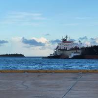 Tugs attend an MR product tanker in the deep-water Port of Guam (Photo: Inchcape)