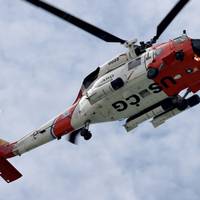 (U.S. Coast Guard stock photo:  MH-60 Jayhawk helicopter)