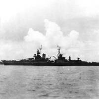 USS Indianapolis (CA-35) preparing to leave Tinian after delivering atomic bomb components, circa July 26, 1945. She was sunk on July 30 while en route to the Philippines. (Donation of Major Harley G. Toomey, Jr., USAF(Retired), 1971, who took this photograph. U.S. Naval Historical Center Photograph)