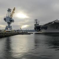 USS Nimitz arrives pierside at Naval Base Kitsap Bremerton for a planned incremental availability at Puget Sound Naval Shipyard and Intermediate Maintenance Facility where the ship will receive scheduled maintenance and upgrades. (U.S. Navy photo by Ryan J. Mayes)