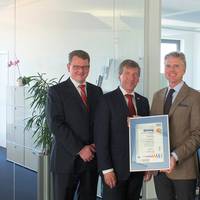 Wolfgang Engel, SGS Lead Auditor (2nd left) in Röhlig's Bremen headquarters presenting the certificate to (from left) Marc Guse, Hans-Ludger Körner and Angela Dooms.