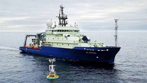 The research vessel Neil Armstrong arrived to recover a surface mooring that is part of the OOI Global Array in the Irminger Sea south of Greenland in 2016. (Photo by James Kuo, Woods Hole Oceanographic Institution)