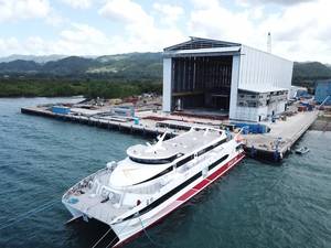 Hull 680 in front of the new 120 metre assembly bay at Austal Philippines shipyard in Balamban, Cebu (Image: Austal)