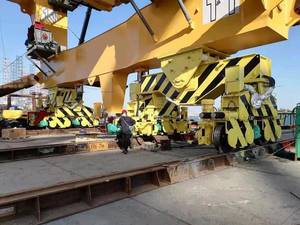 The crane BASIS is installed in the saddle bracket between the sill beam and main equalizer beam. There are four corners for each crane. This photo shows two corners on the waterside; the two corners on the landside are not shown. Photo courtesy Casper, Phillips & Associates Inc. (CPA).