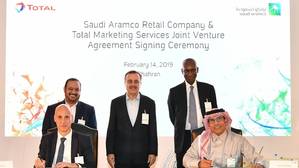 Group photo of Saudi Aramco management and Total management