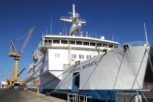 Africa Mercy alongside at a repair berth in Astican Shipyard, Las Palmas, Gran Canaria for brief annual upkeep period of repairs and modernization.  (Photo credit: © Mercy Ships/Ann Berry)