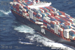 At least nine containers are reported to be protruding from APL England after the ship lost at least 40 containers overboard off the coast of Australia. (Photo: AMSA)