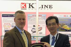At the Sea Japan exhibition in Tokyo, Toyohisa Nakano, (right) Executive Officer, K Line, accepts a "Great Ship of 2017" award from Maritime Reporter & Engineering News Editor and Associate Publisher Greg Trauthwein. (Photo: Rob Howard)