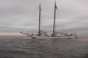Beached Schooner. No Cure No Pay offered and signed. Schooner refloated within two hours. All costs and award settled in three days.  Photos courtesy Rik van Hemmen