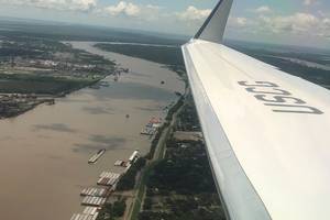 Flying into New Orleans with Admiral Karl Schultz, Commandant, USCG, provides a ‘birds eye view’ on the robust and diverse business in and around the lower Mississippi River.  Photo: Greg Trauthwein
