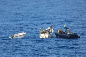 Six suspected pirates and their vessels were detained following reported attacks on a containership and a fishing vessel off Somalia (Photo: EU NAVFOR Somalia)