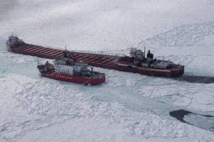 The crew of Coast Guard Cutter Mackinaw, homeported in Cheboygan, Mich., conducts an escort on Lake Superior near Whitefish Point April 3, 2014. (USCG photo)