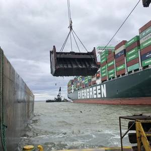 Dredgers Working to Free Containership Stuck Near Baltimore