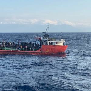 Ship with Hundreds of Afghan Migrants Docks at Greek Port