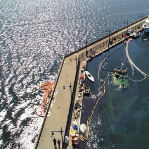 Oil Spill Cleanup Underway After Tug Sinks at Marina