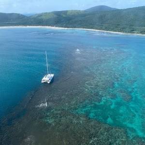 Salvors Send Crane Barge to Refloat Yacht that Grounded in Puerto Rico