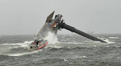 A U.S. Coast Guard Response Boat-Medium boat crew