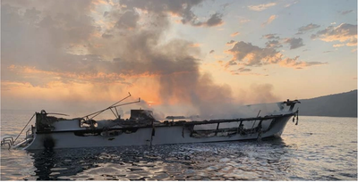 The fire-stricken Conception shortly before it sank off Santa Cruz Island in September 2019. All 33 passengers and one of six crewmembers died of smoke inhalation after they were trapped in the berthing area while a fire raged on the deck above. (Photo: Ventura County Fire Department)