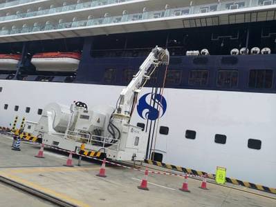 A battery-powered AMPMobile unit connects a ship to shore power at Shenzhen cruise terminal. (Photo:Cavotec)