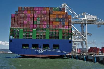 A boxship discharges cargo at the Port of Oakland (c) Port of Oakland