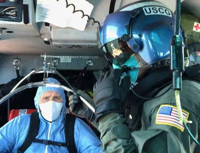 A Coast Guard Air Station Houston MH-65 Dolphin helicopter aircrew medevacs a 36-year-old crewmember from a tanker vessel approximately 35 miles offshore Freeport, Texas, July 30, 2020. The crewmember was transferred to awaiting emergency services personnel and was reported to be in stable condition. (U.S. Coast Guard photo)