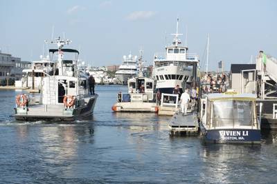 A Coast Guard Station Boston 45-foot response boat crew stands by at Long Wharf in Boston, Thursday, August 16 after responding to a collision between a water taxi and sailboat in Boston Harbor. (U.S. Coast Guard photo by Andrew Barresi)
