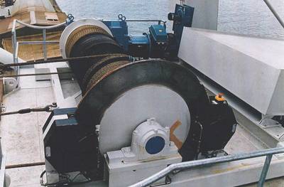 A luffing and trolley travel hoist for bagged material used by two vessel loaders at Lake Charles, Louisiana. The hoists are fitted with Dellner SKP service brakes with mounting stands installed between the hoist motors and the reduction gears. The brakes were also manufactured with extra protection to prevent corrosion from sea water.
