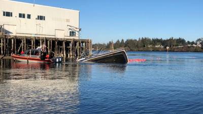 A U.S. Coast Guard boatcrew rescued four people from Darean Rose, a 40-foot commercial fishing vessel that sank in Coos Bay, Ore. (U.S. Coast Guard photo courtesy of Sector North Bend)